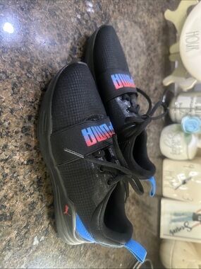 Kids 1.5Y Puma Black Sneakers with Blue Heel Tabs and Red/Blue Logo Strap